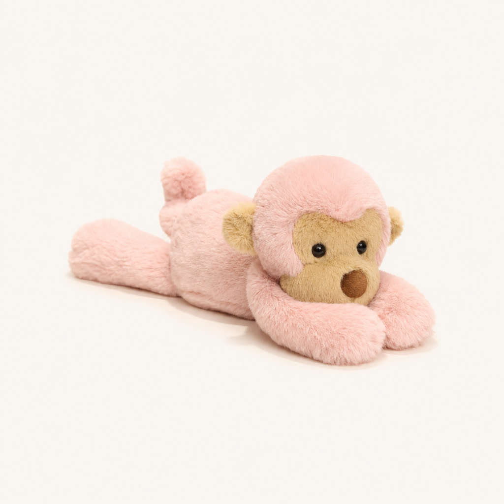 Peluche singe rose de 40 cm vue de face et trois-quarts sur fond ivoire