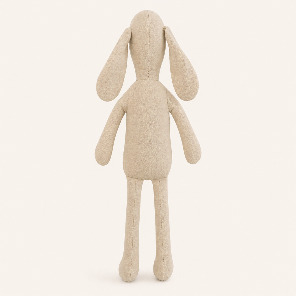 Doudou lapin en tissu beige vu de dos sur fond ivoire
