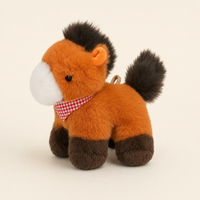 Petit cheval en peluche orange, vue de face