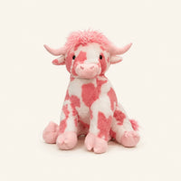 Peluche vache Highland rose, environ 20 cm, fond ivoire