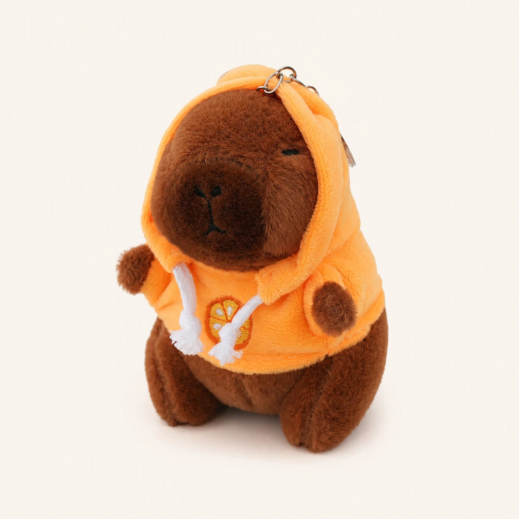 Peluche capybara pendentif porte-cles avec sweat orange, environ 12 cm, fond ivoire