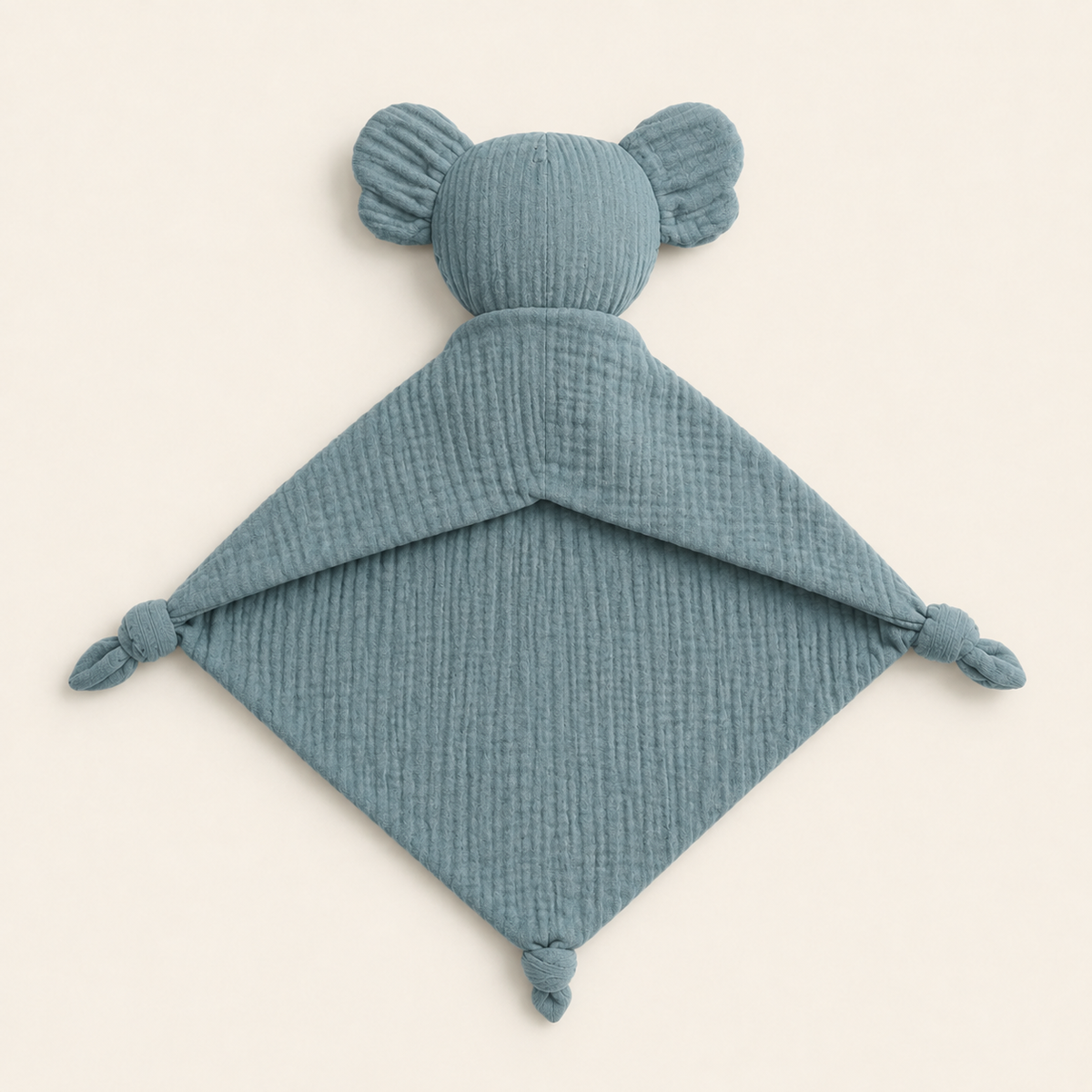 Doudou personnalisé koala bleu grisé, vue de dos sur fond ivoire