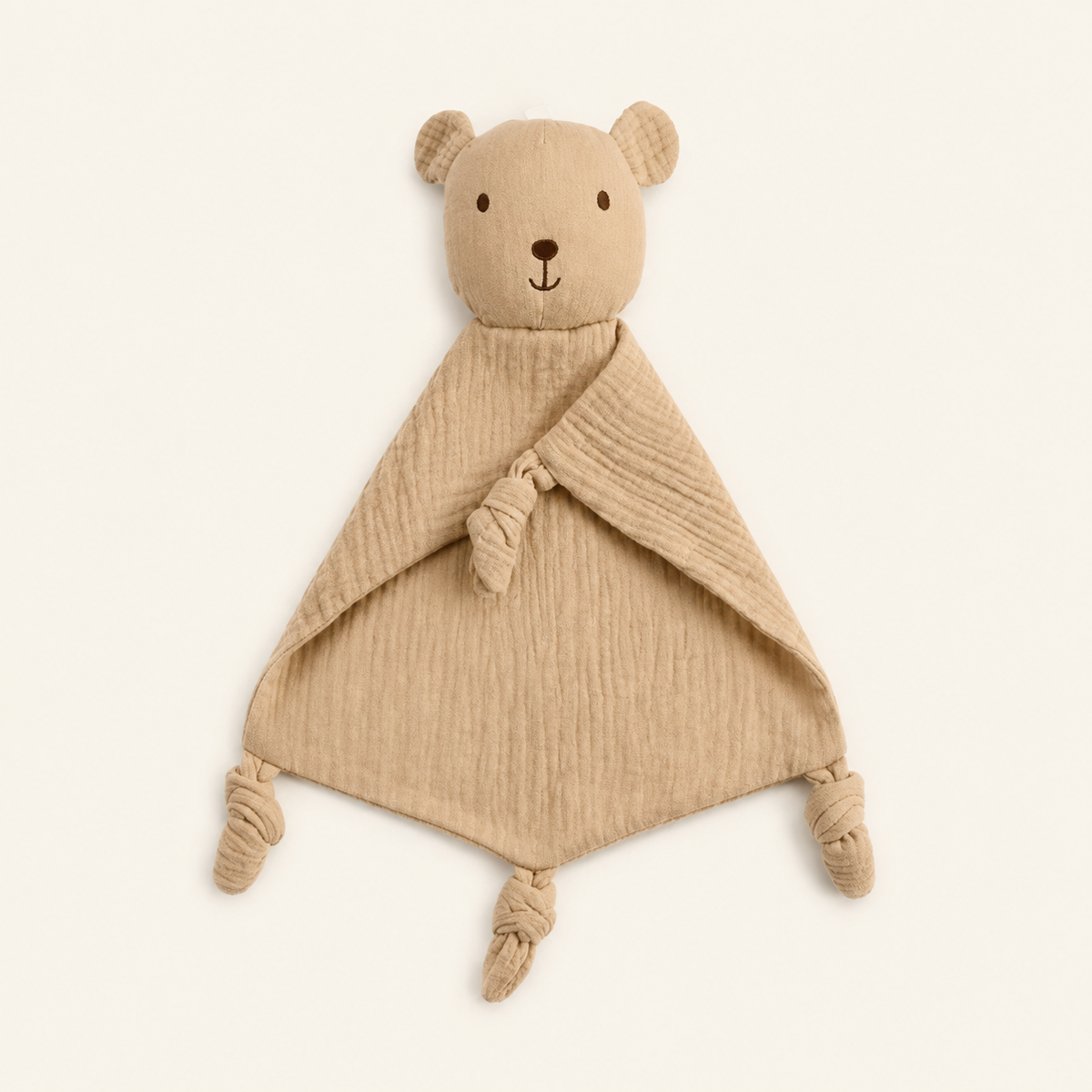 Doudou personnalisé ours beige en gaze de coton, vue de face sur fond ivoire