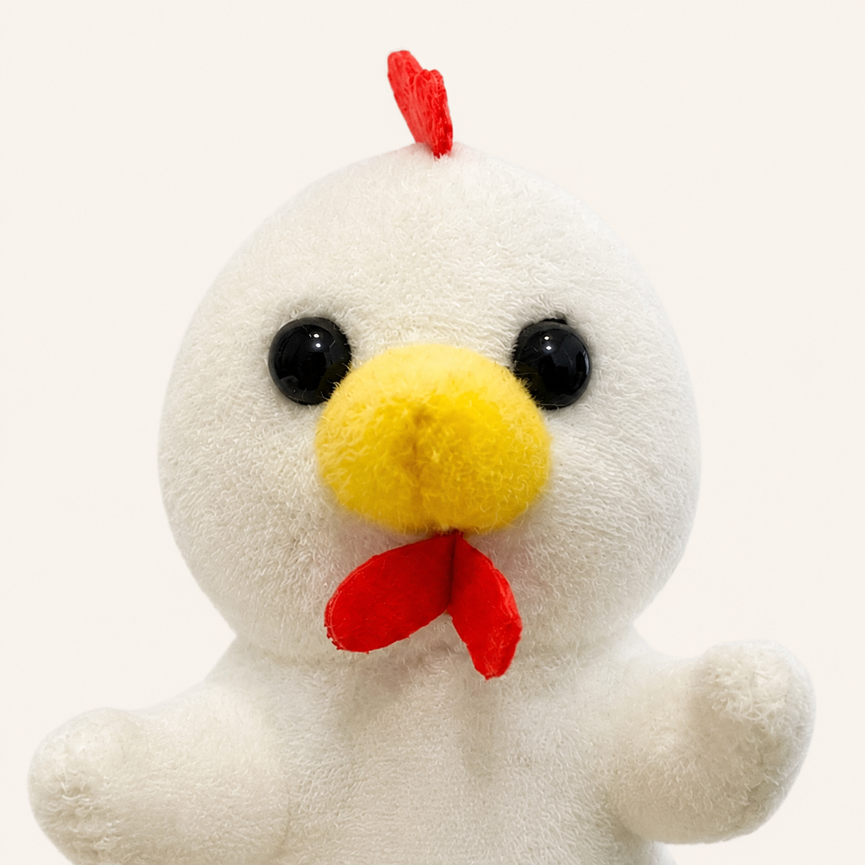 Détail visage marionnette poule
