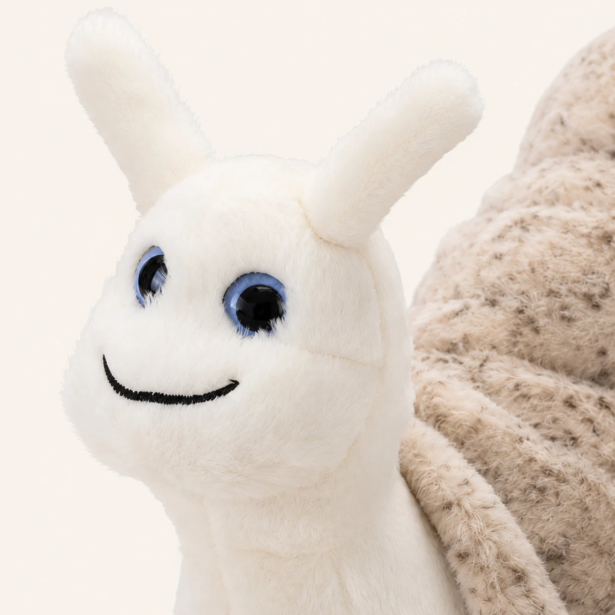 Coussin Peluche Escargot Blanc Beige