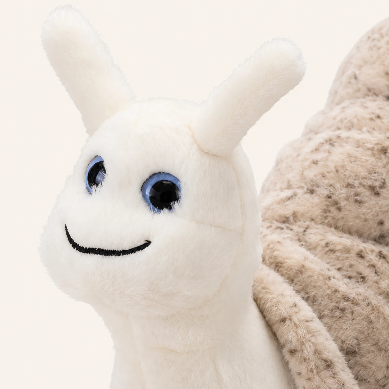 Coussin Peluche Escargot Blanc Beige