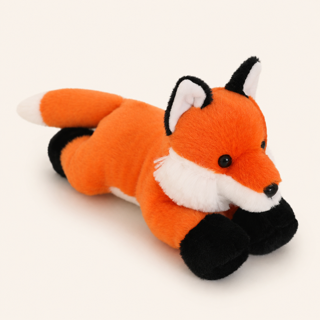 Mini peluche renard couchée, vue de trois quarts