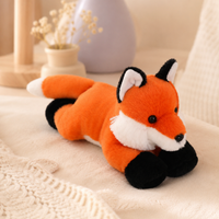 Mini peluche renard en décor de chambre