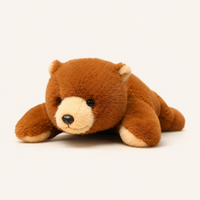 Coussin peluche ours brun couché - Royaume Peluche