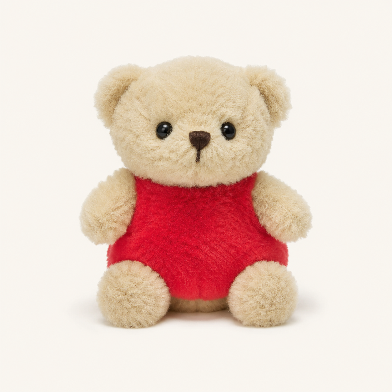 Peluche ours crème tenant un cœur rouge - Royaume Peluche