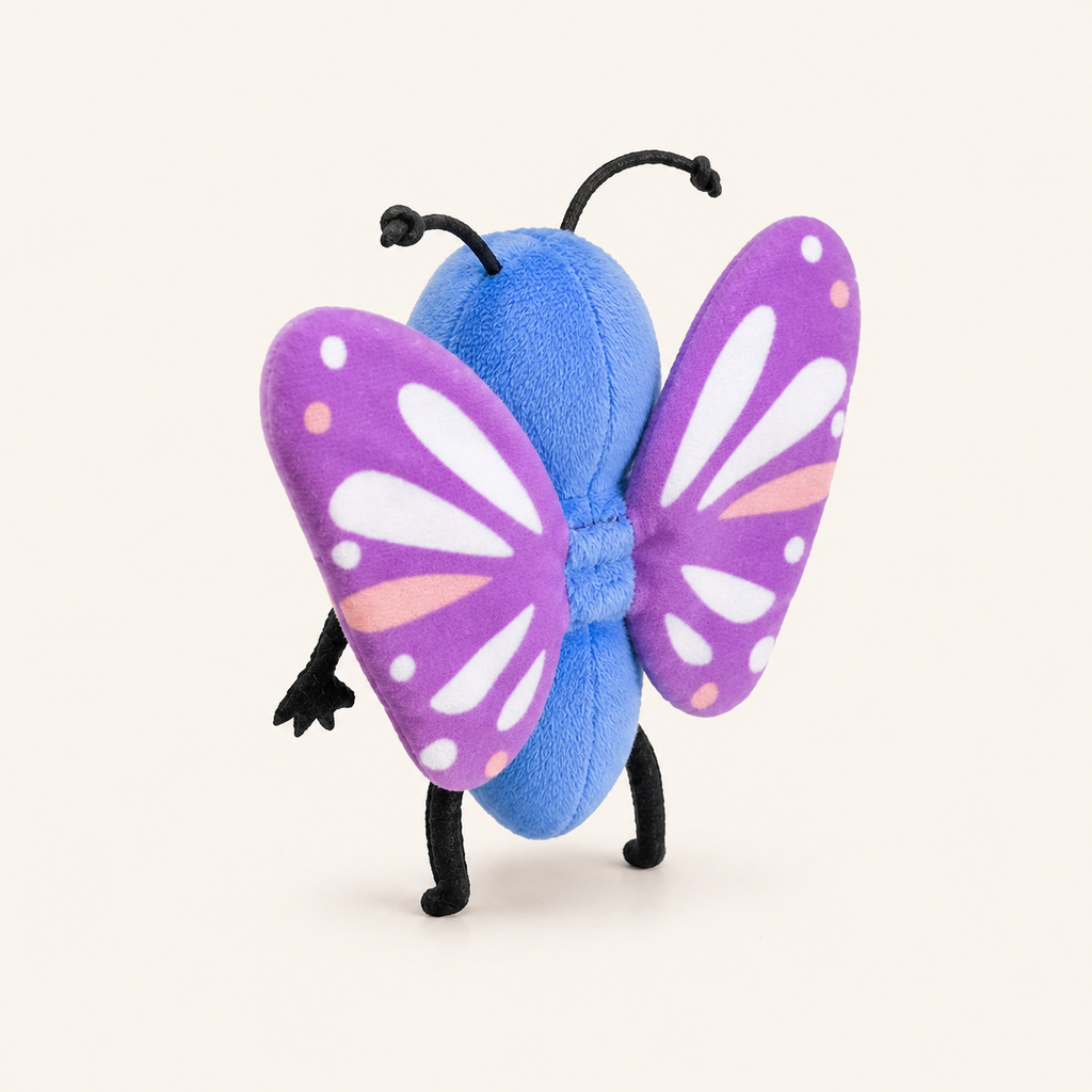 Marionnette à doigt papillon peluche vue de trois quarts