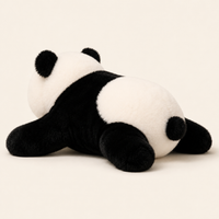 Coussin peluche panda couché, autre angle - Royaume Peluche