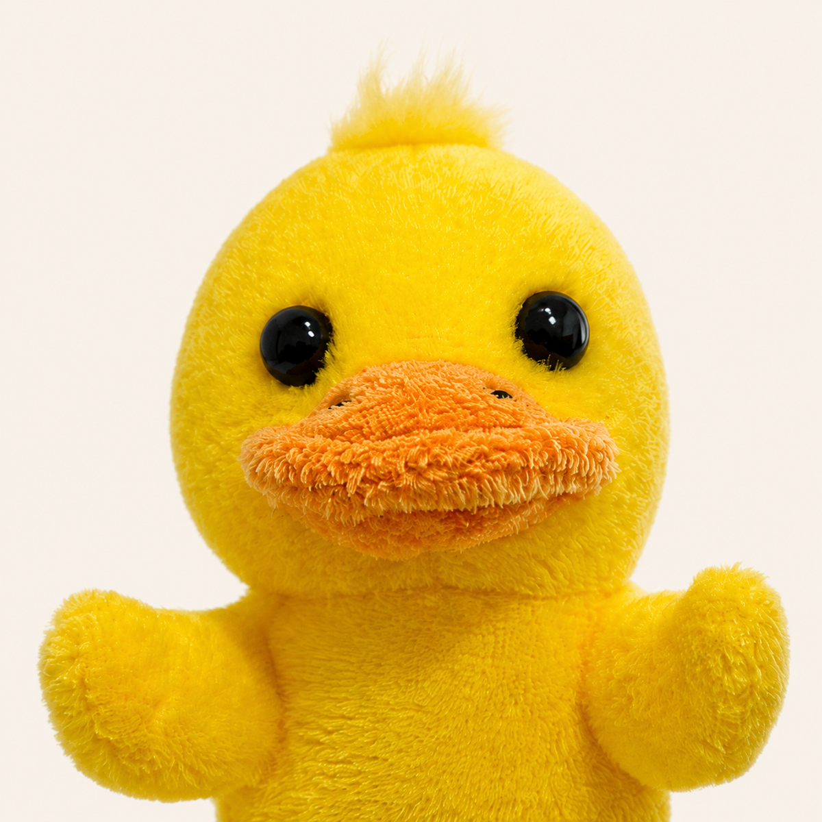 Détail visage marionnette canard jaune