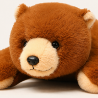 Coussin peluche ours brun, gros plan visage - Royaume Peluche