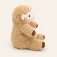 Peluche mouton agneau beige, vue de profil de côté
