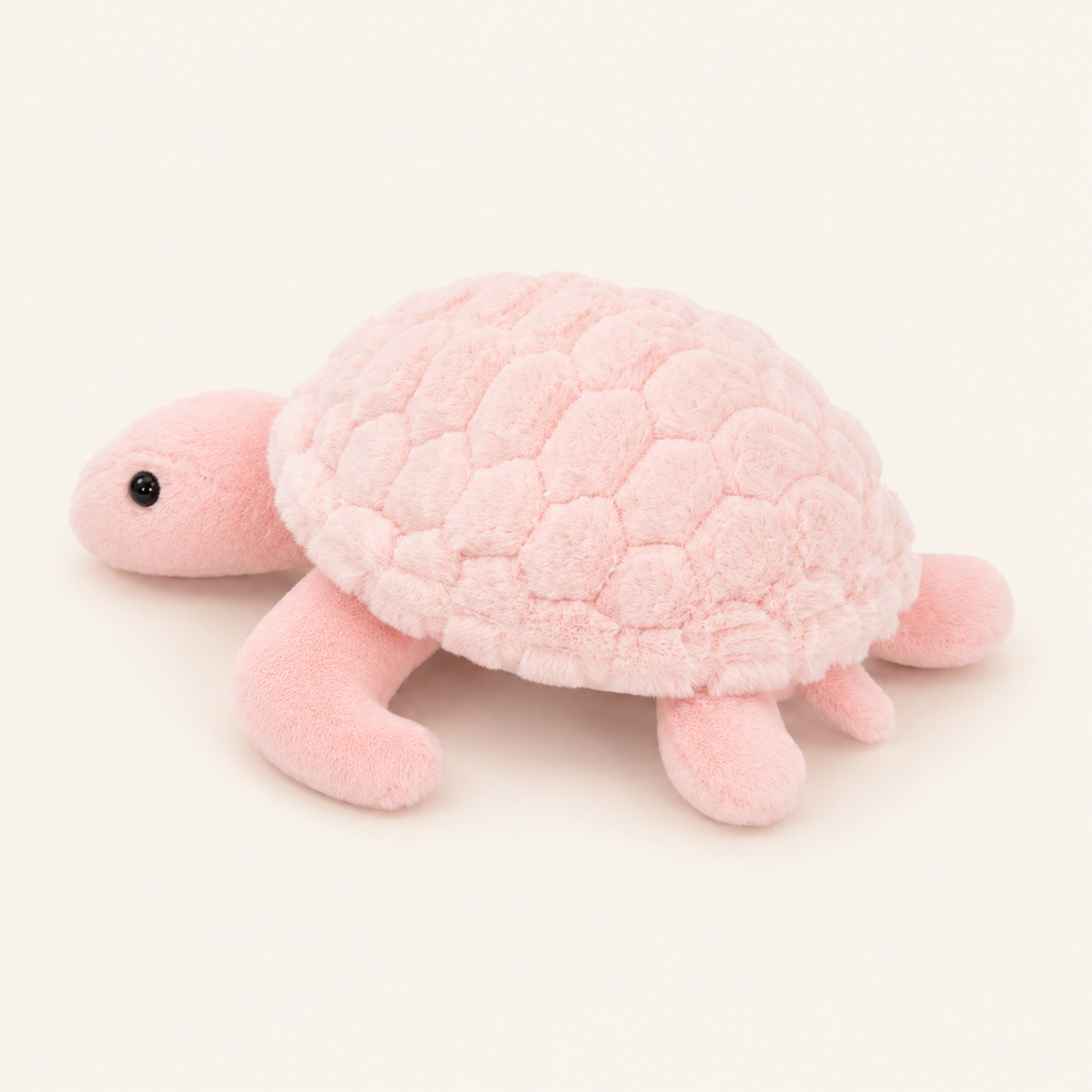 Peluche tortue rose, vue de profil