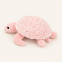 Peluche tortue rose, vue de profil