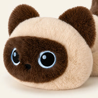 Gros plan sur le visage de la peluche chaton siamois