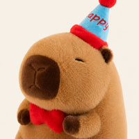 Gros plan sur le visage et la texture de la peluche capybara