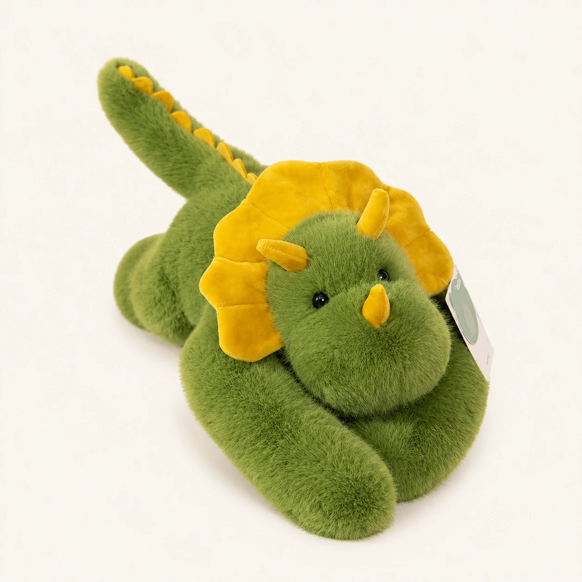 Peluche triceratops verte à longs bras, vue principale sur fond ivoire