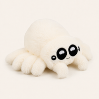 Peluche araignée blanche, autre angle, fond ivoire