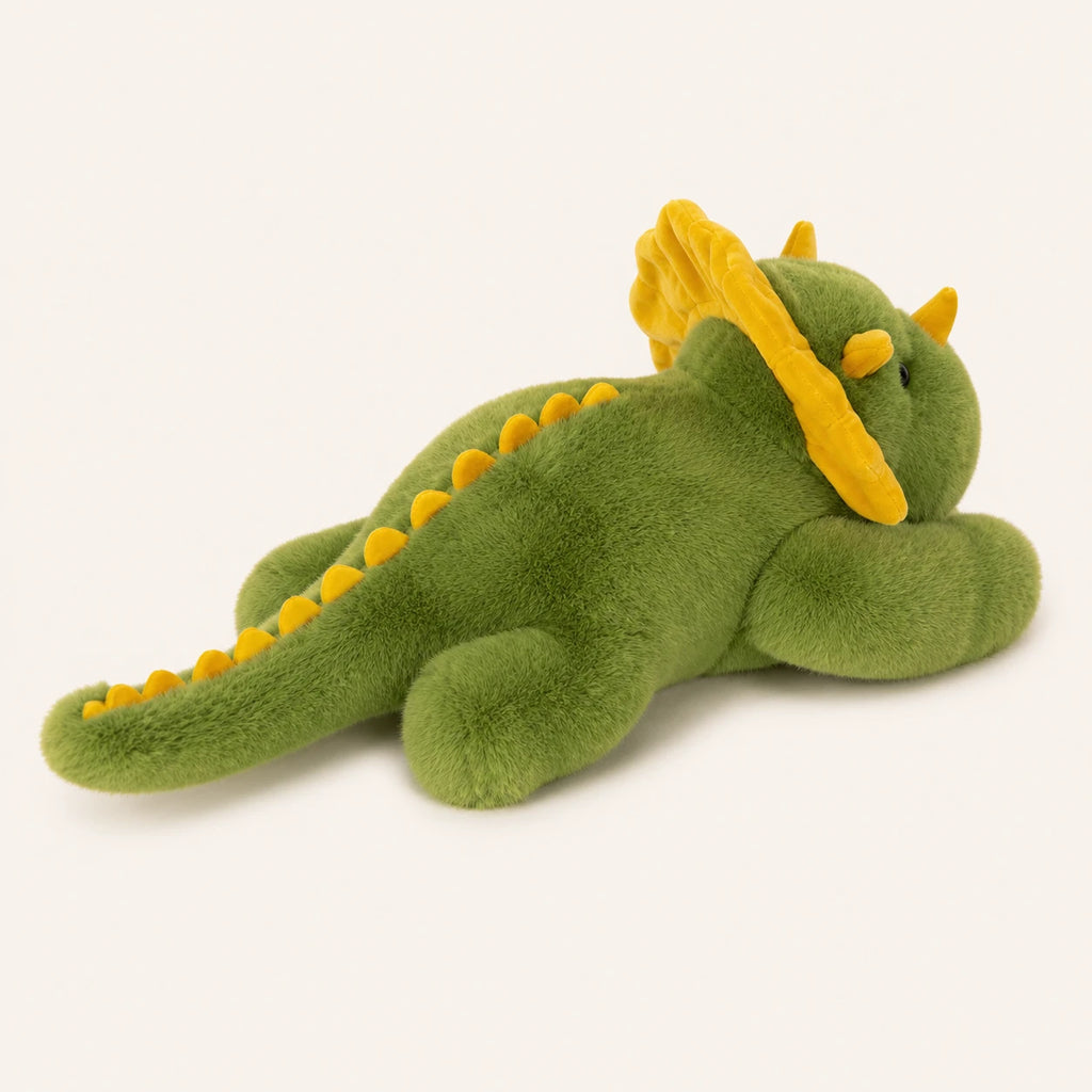 Peluche triceratops verte, autre angle sur fond ivoire