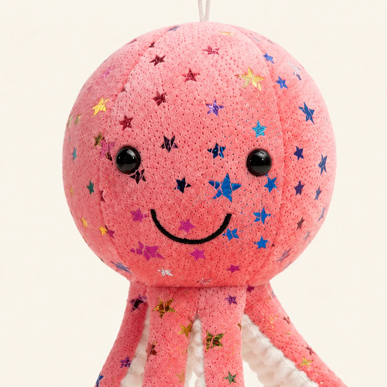 Peluche poulpe rose etoile detail