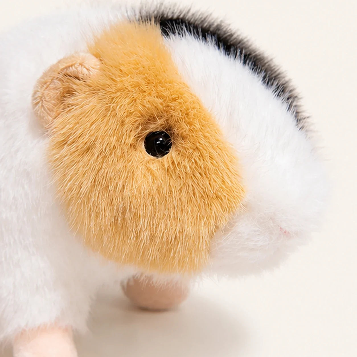Peluche cochon d'Inde trois couleurs - détail doux