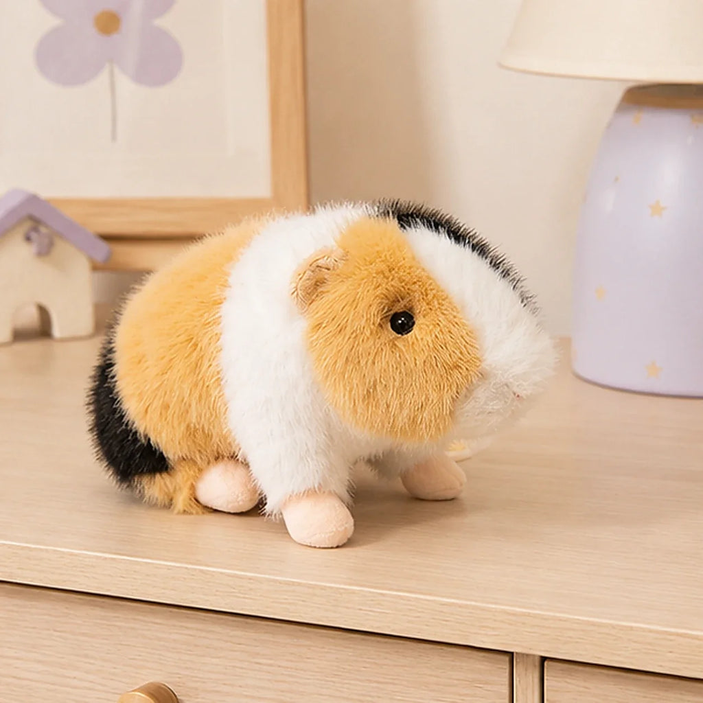 Peluche cochon d'Inde trois couleurs en situation