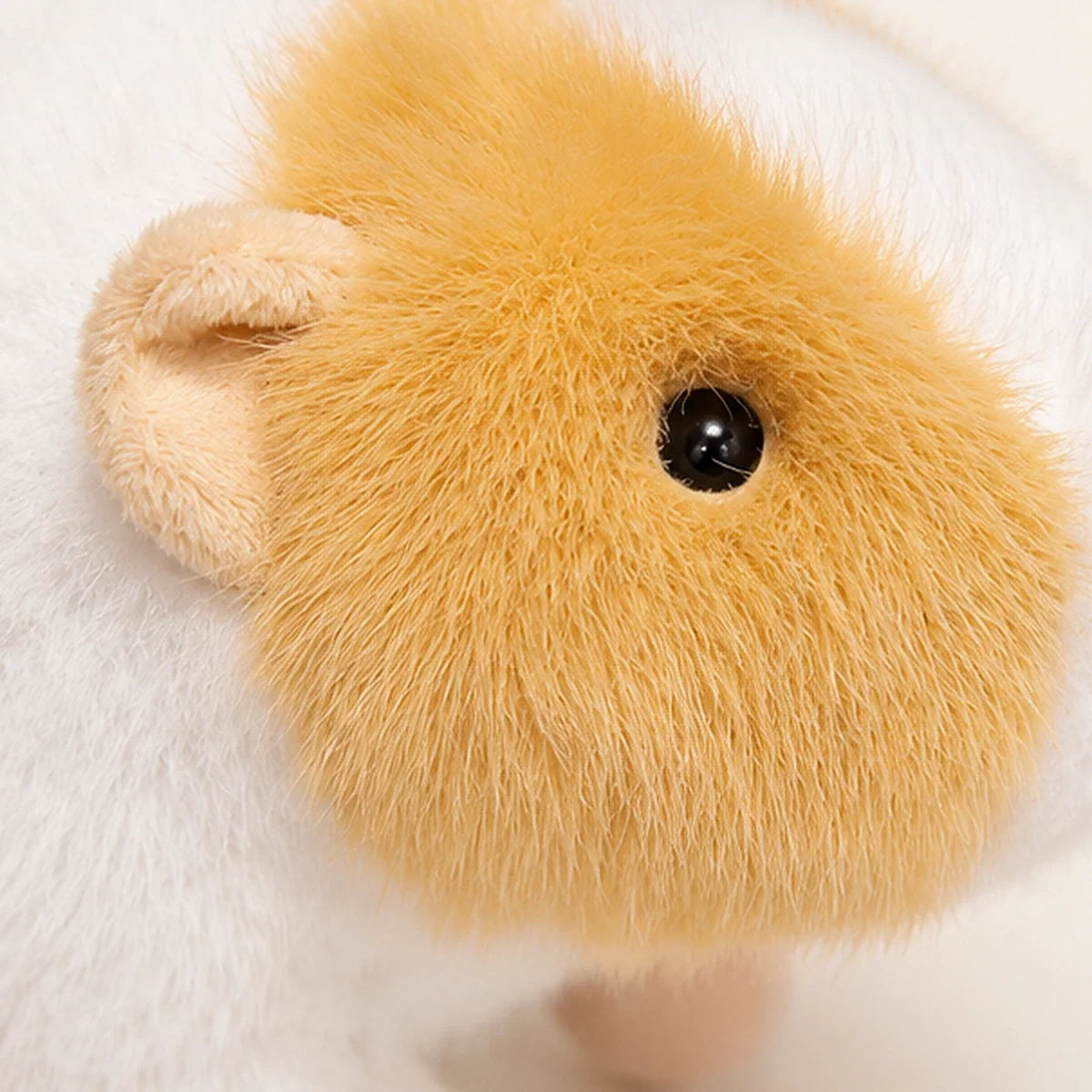 Peluche cochon d'Inde jaune blanc - détail doux