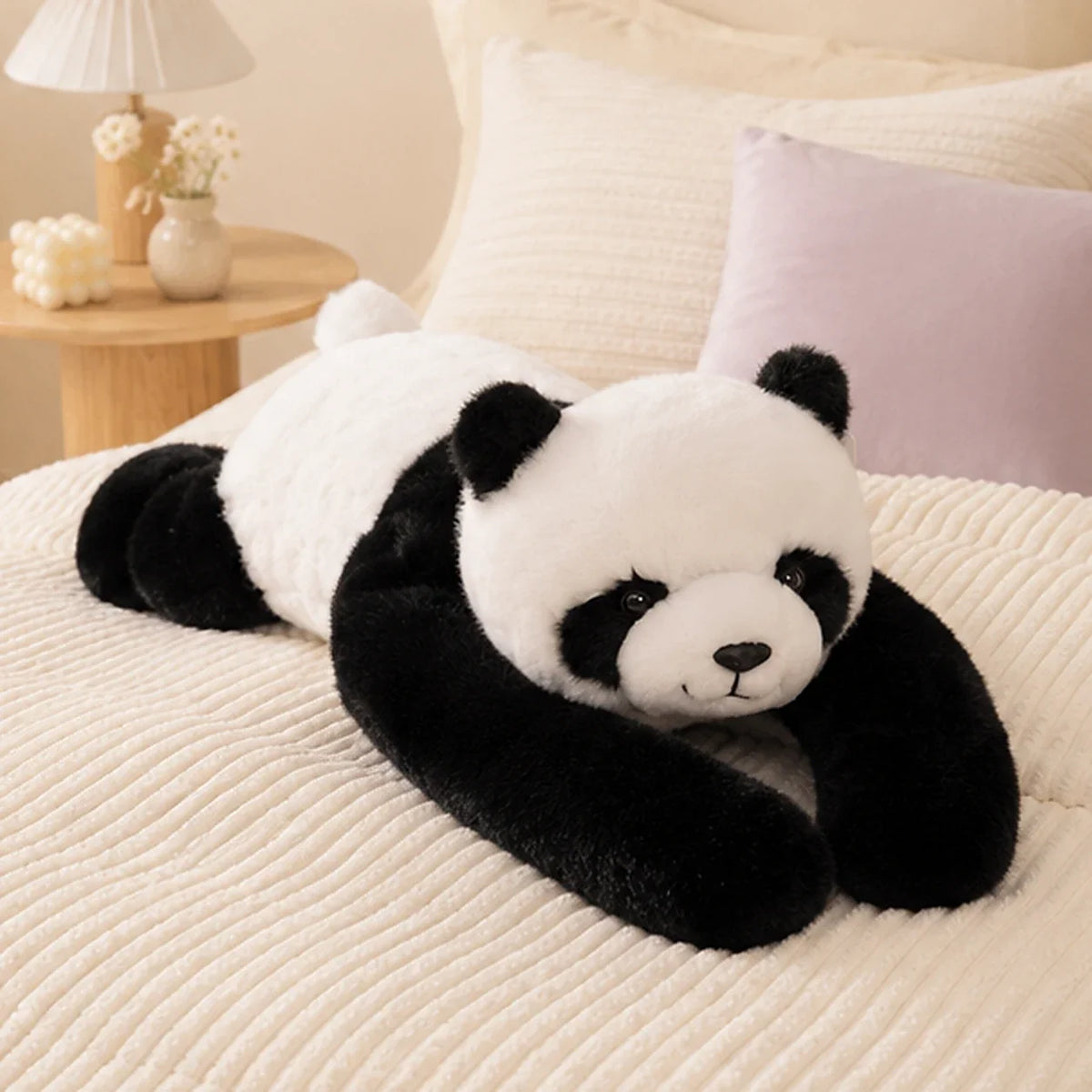 Peluche panda lestée 65 cm en situation
