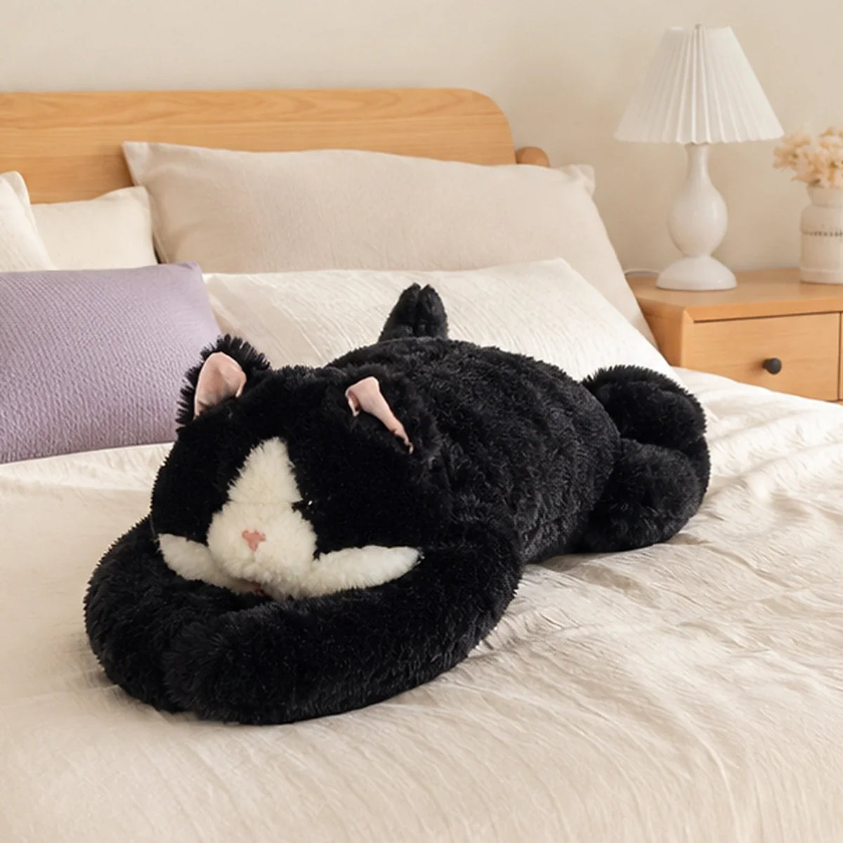 Peluche chat lestée 65 cm en situation