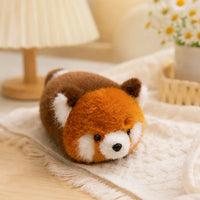 Peluche panda roux 16 cm - mise en situation