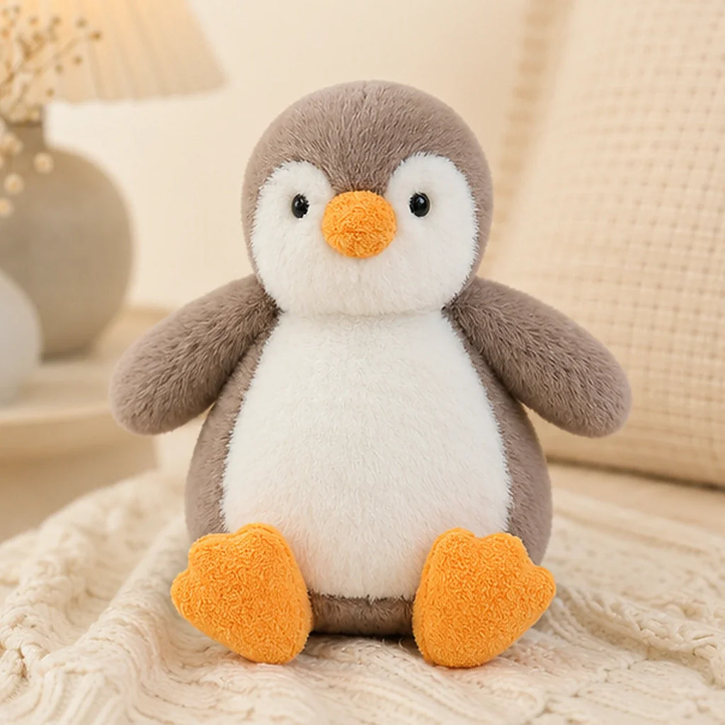 Peluche pingouin 20-23 cm - mise en situation