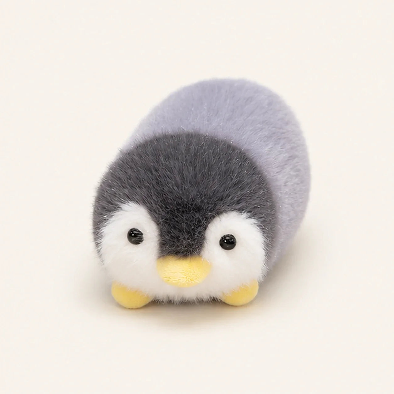 Peluche pingouin allongee 16 cm - photo principale