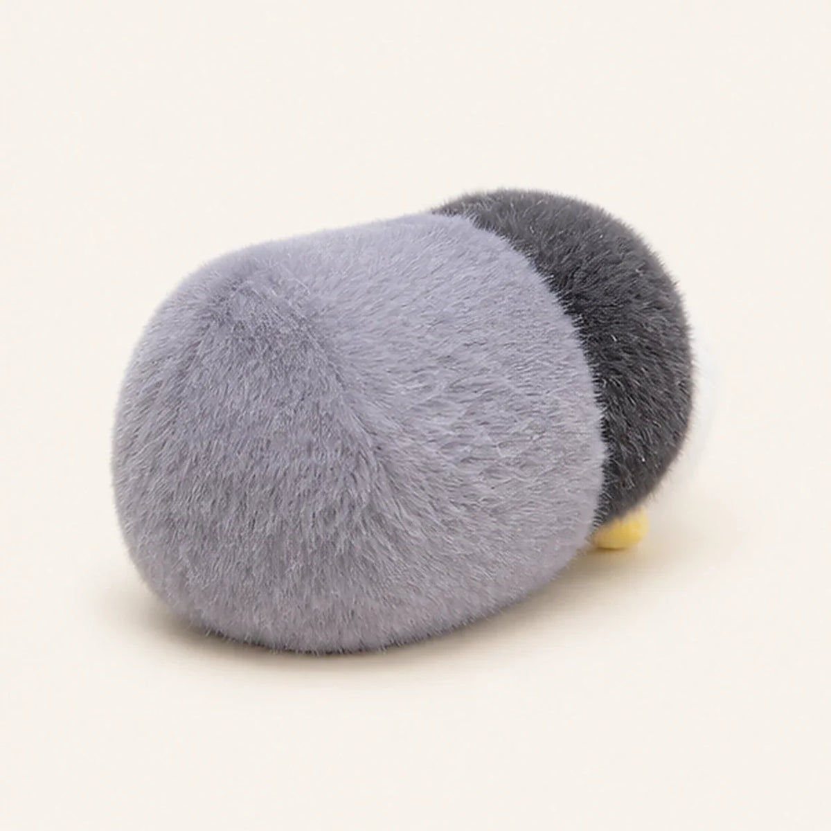 Peluche pingouin allongee 16 cm - autre angle