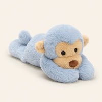 Peluche singe bleue 40 cm couchee, vue principale sur fond ivoire
