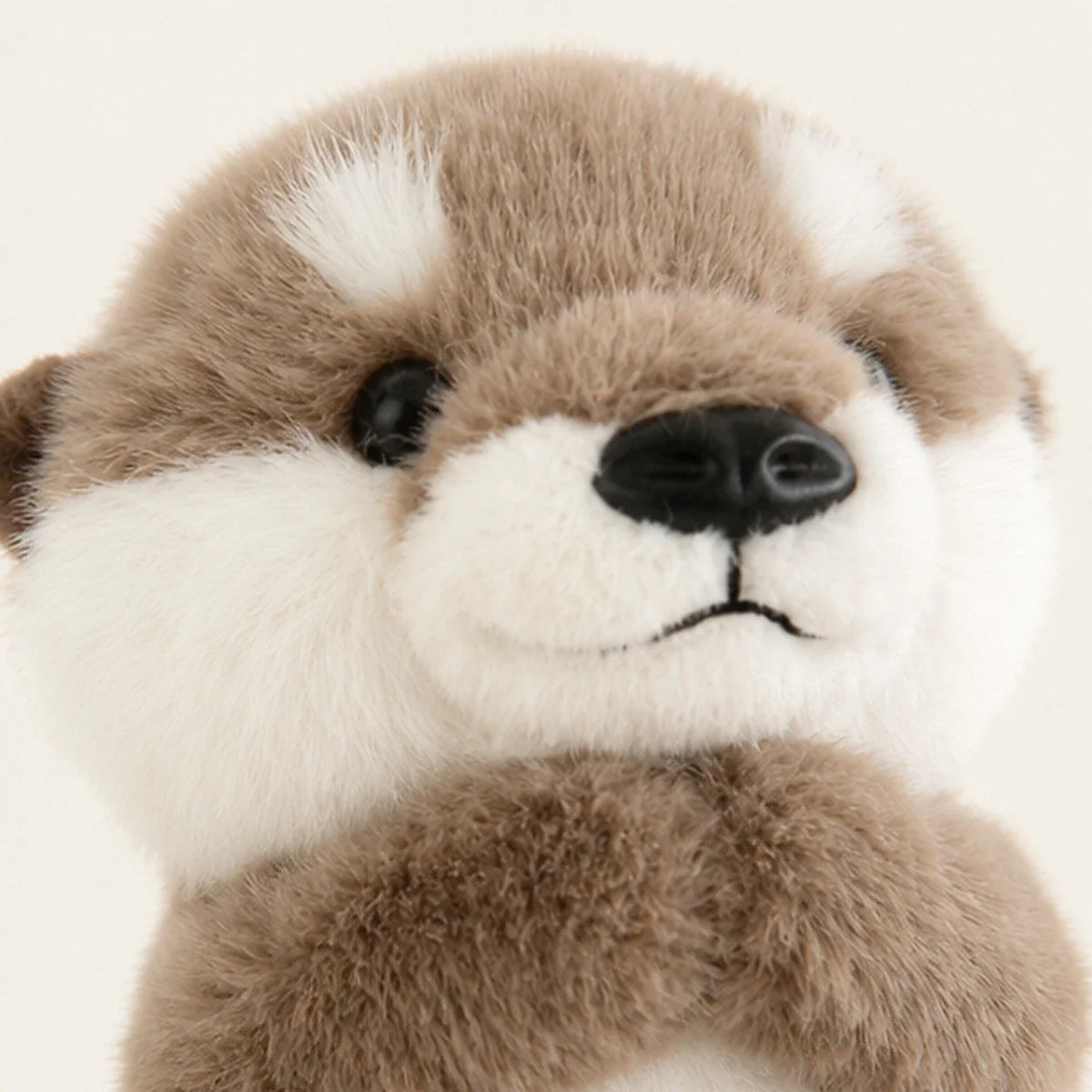 Peluche loutre marron - détail