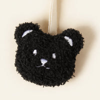 Attache-tétine doudou ours noir — détail texture
