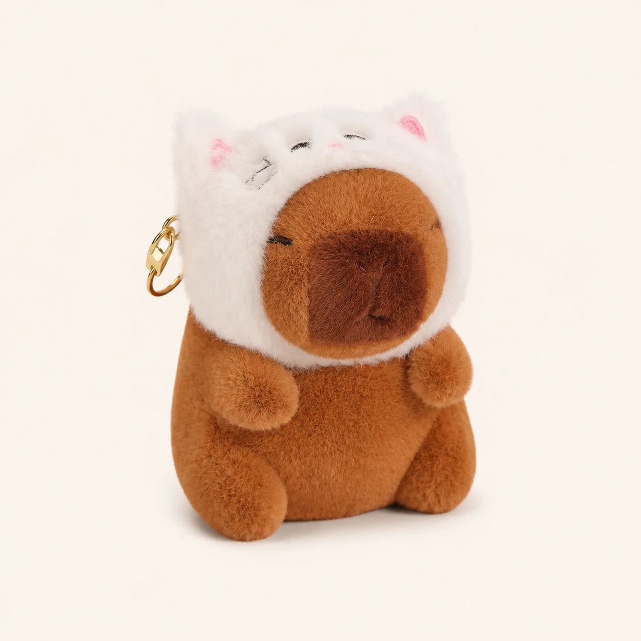Peluche capybara déguisée en chat blanc, vue de face - Royaume Peluche