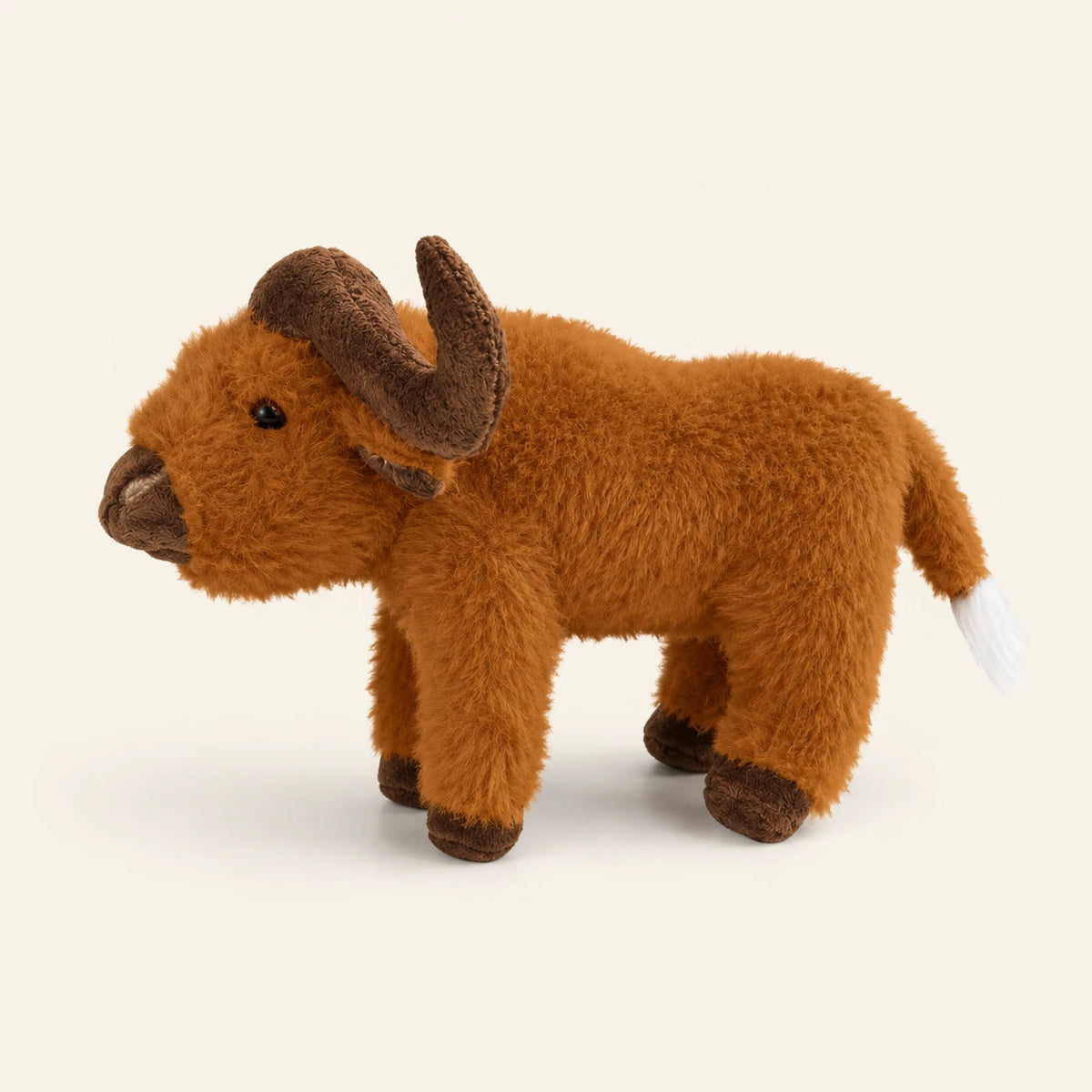 Peluche vache Highland marron 25 cm, vue principale sur fond ivoire