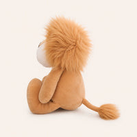 Peluche lion vue de profil, fond ivoire