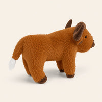Peluche vache Highland vue de l'autre côté sur fond ivoire