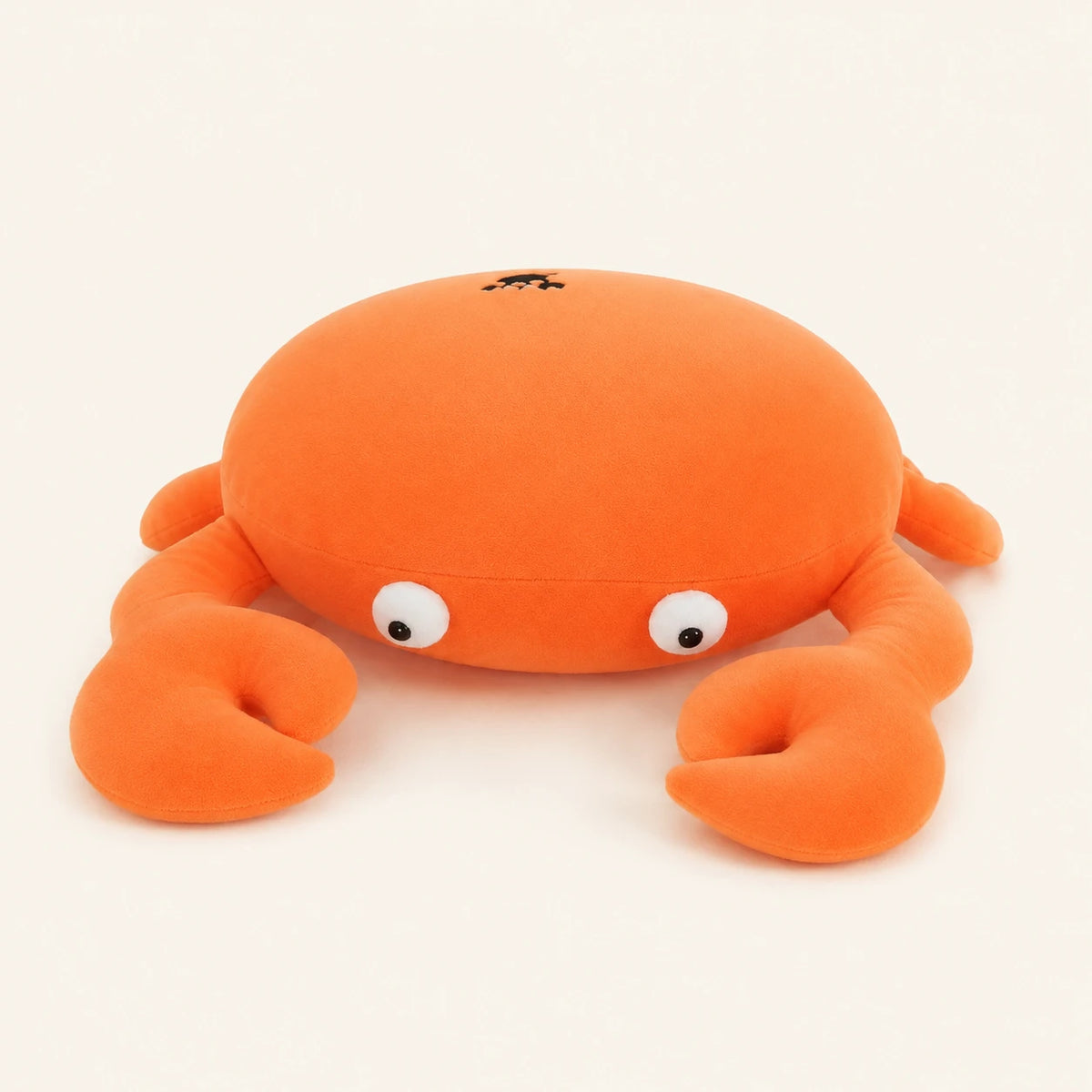 Coussin peluche crabe orange