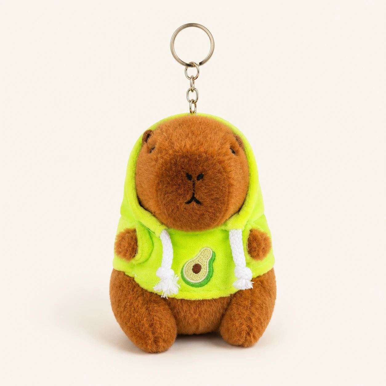 Peluche porte-clés capybara à capuche verte avocat, vue de face