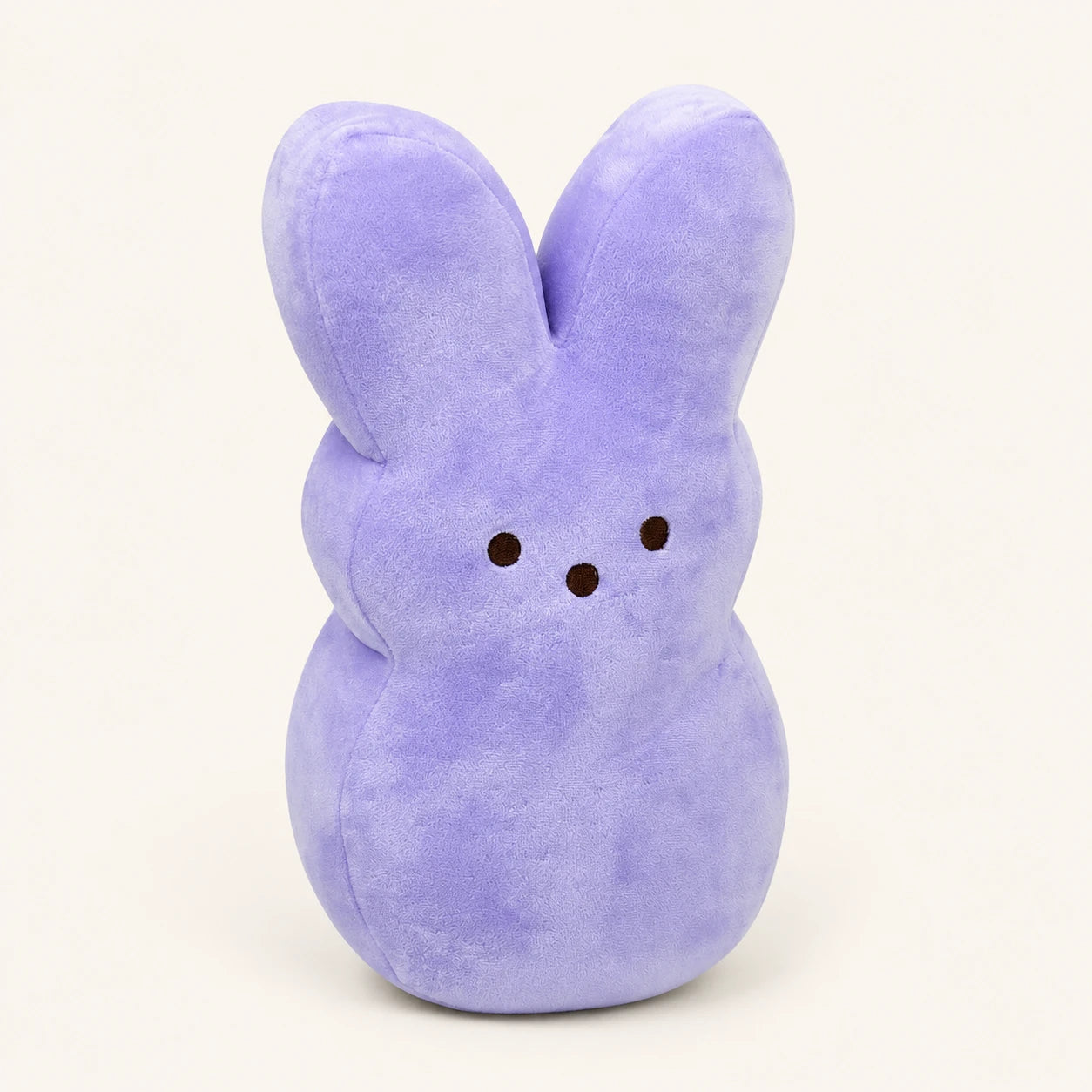 Peluche lapin de Pâques violet style Peeps, vue de face, environ 15 cm, fond ivoire