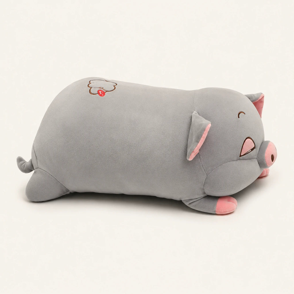 Peluche cochon dodu gris, vue de profil sur fond ivoire
