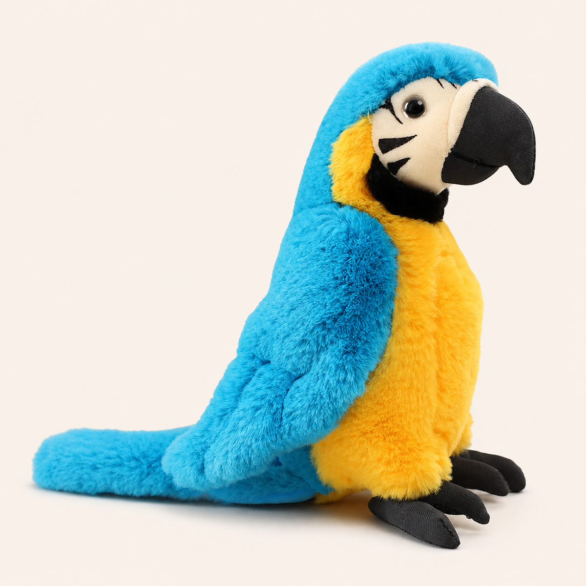 Peluche perroquet ara bleu et jaune, vue principale sur fond ivoire