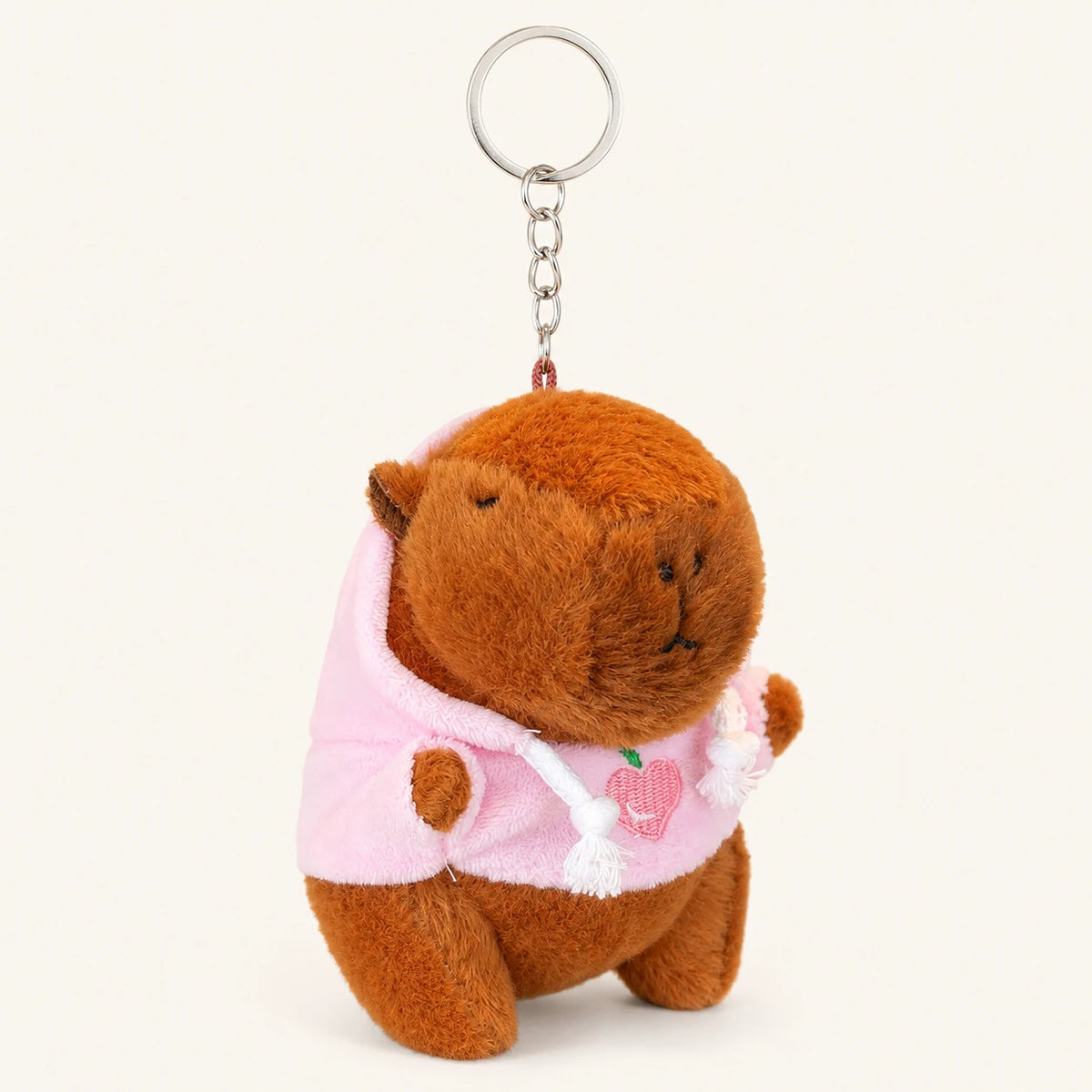 Peluche porte-clés capybara à capuche rose, vue de face