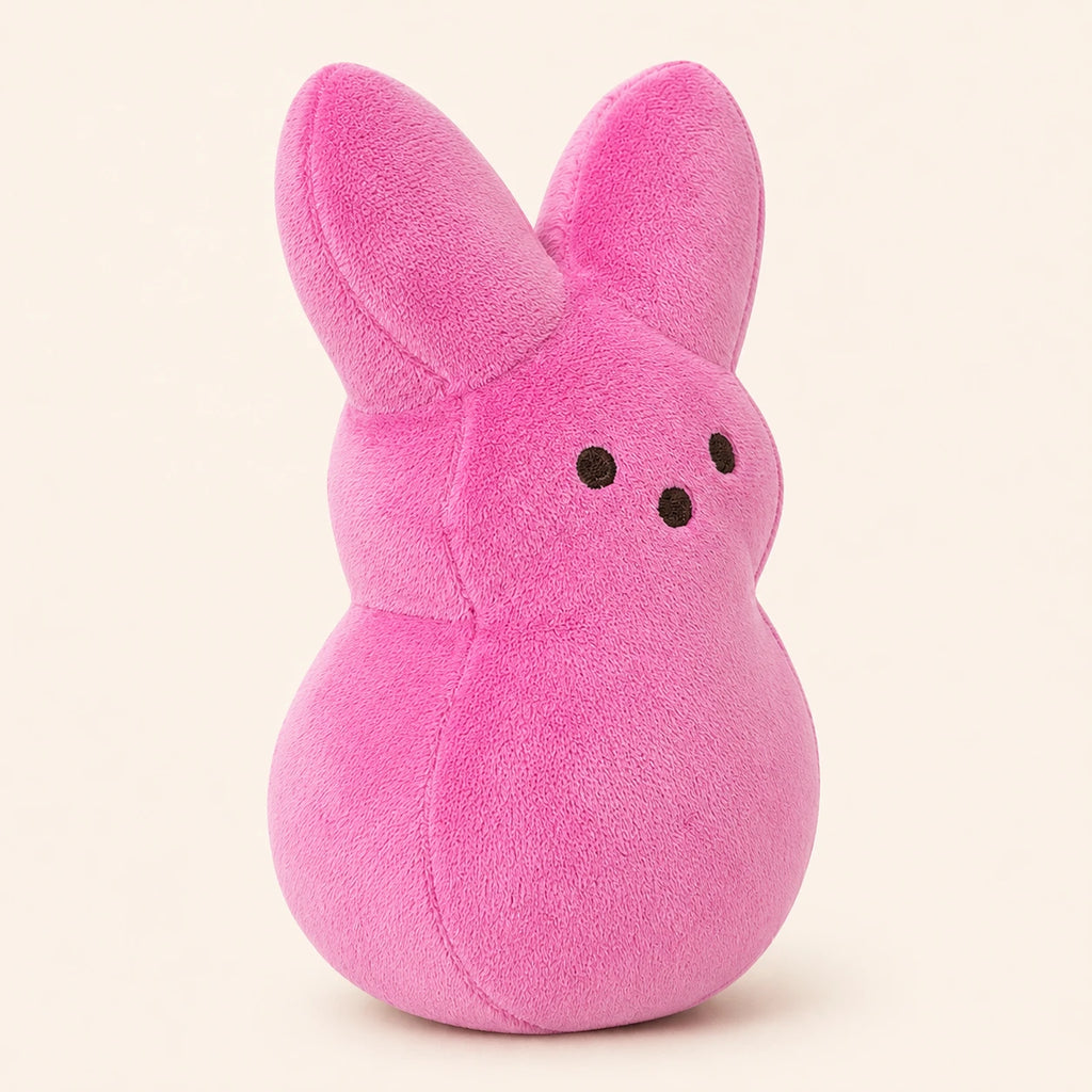 Peluche lapin de Pâques rose, vue de dos, fond ivoire